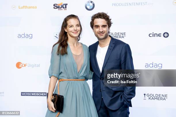 German singer Yvonne Catterfeld and her husband German actor Oliver Wnuk attend the summer party 2017 of the German Producers Alliance on July 12,...