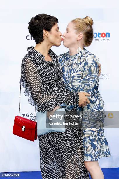 German actress and presenter Jasmin Gerat and German actress Jasmin Schwiers attend the summer party 2017 of the German Producers Alliance on July...