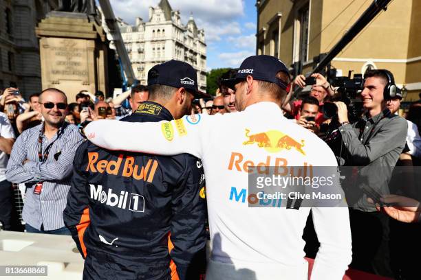 Daniel Ricciardo of Australia and Red Bull Racing and Max Verstappen of Netherlands and Red Bull Racing talk to the media during F1 Live London at...