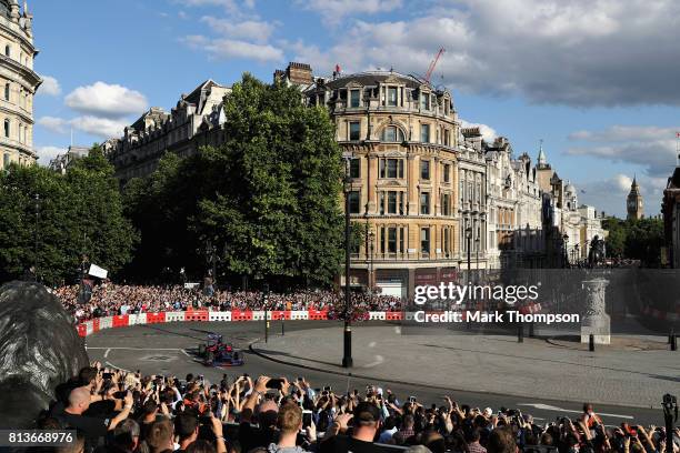 Carlos Sainz of Spain and Scuderia Toro Rosso driving the Scuderia Toro Rosso STR8 during F1 Live London at Trafalgar Square on July 12, 2017 in...