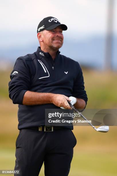 Thomas Bjorn of Denmark hits his second shot on the 13th hole during day one of the AAM Scottish Open at Dundonald Links Golf Course on July 13, 2017...