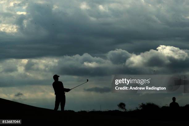 Rickie Fowler of the United States hits his second shot on the 12th hole during day one of the AAM Scottish Open at Dundonald Links Golf Course on...