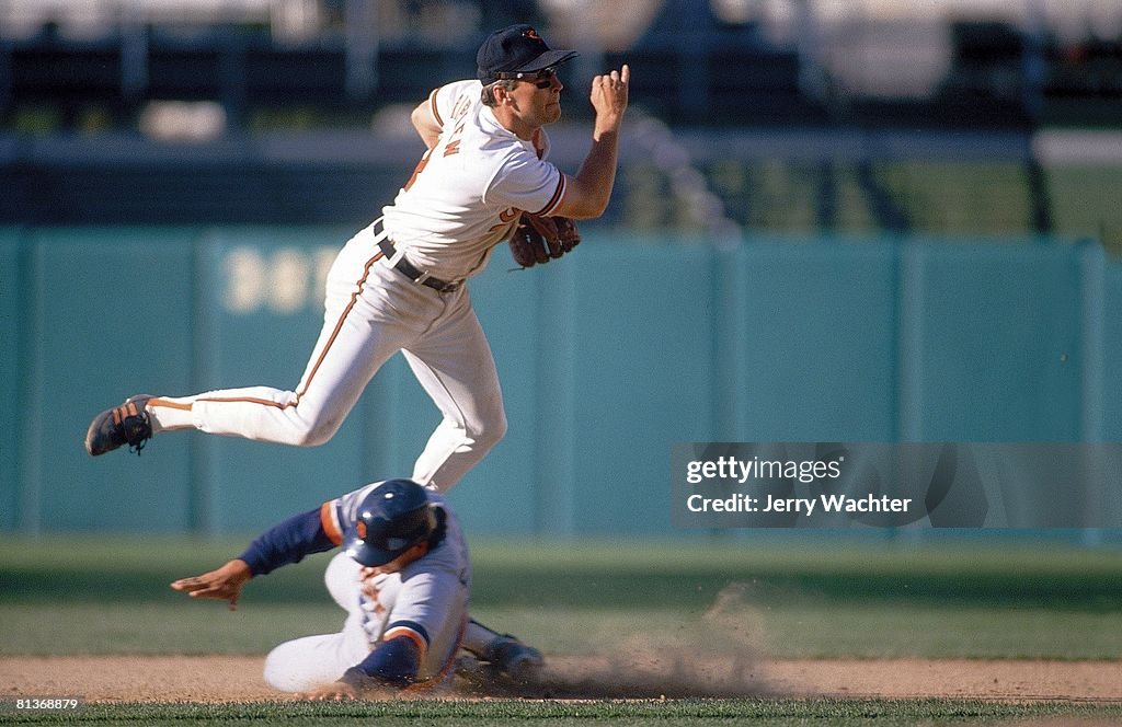 Cal Ripken Height Baltimore Orioles Cal Ripken Jr, in action, turning double play vs ...