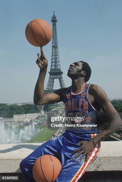 Basketball: Scenic portrait of Harlem Globetrotters Meadowlark Lemon in front of Eiffel Tower, Paris, FRA 6/29/1978