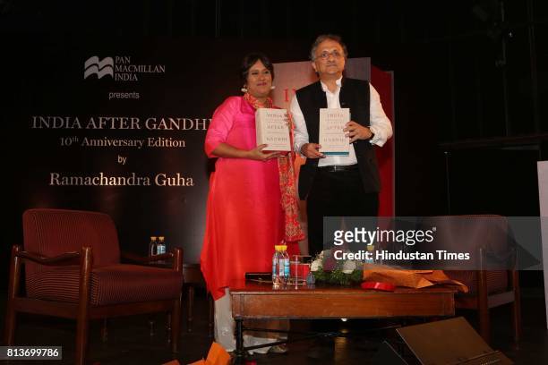 Indian journalist Barkha Dutt with British publisher, historian and author Ramachandra Guha during the launch of the 10th anniversary edition of a...