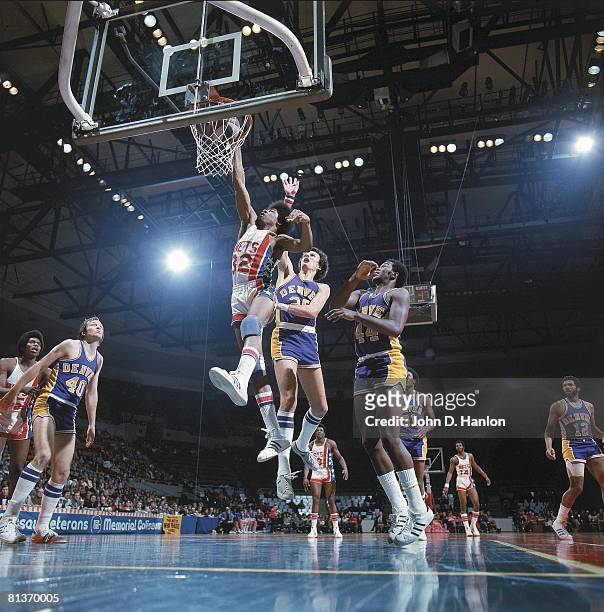 Basketball: New York Nets Julius Dr, J Erving in action vs Denver Nuggets Dave Robisch , Uniondale, NY 12/3/1973