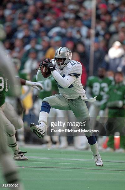 Football: NFC playoffs, Dallas Cowboys Deion Sanders in action, rushing vs Philadelphia Eagles, Irving, TX 1/7/1996