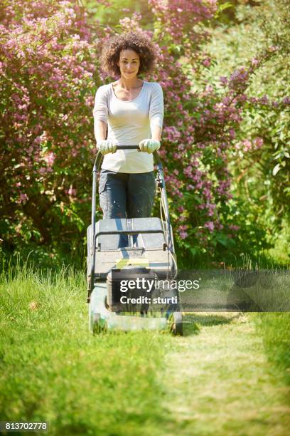 mowing the lawn - mowed lawn stock pictures, royalty-free photos & images