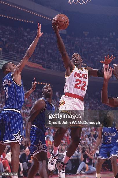 Basketball: NBA Finals, Houston Rockets Clyde Drexler in action, taking layup vs Orlando Magic Penny Hardaway , Game 4, Houston, TX 6/14/1995