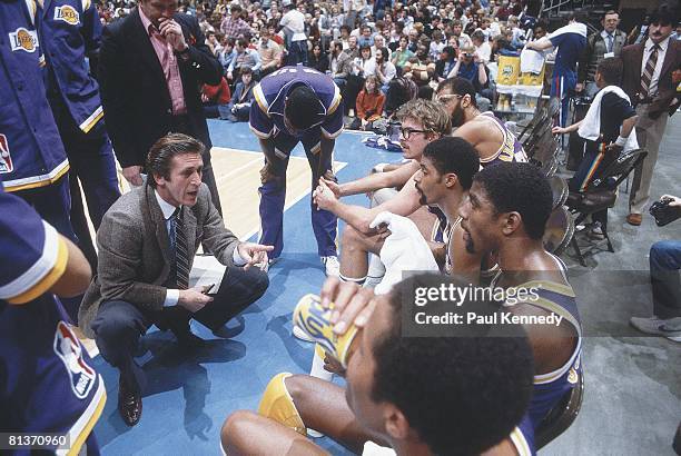 Basketball: Los Angeles Lakers coach Pat Riley with team during game vs New Jersey Nets, East Rutherford, NJ 3/3/1982