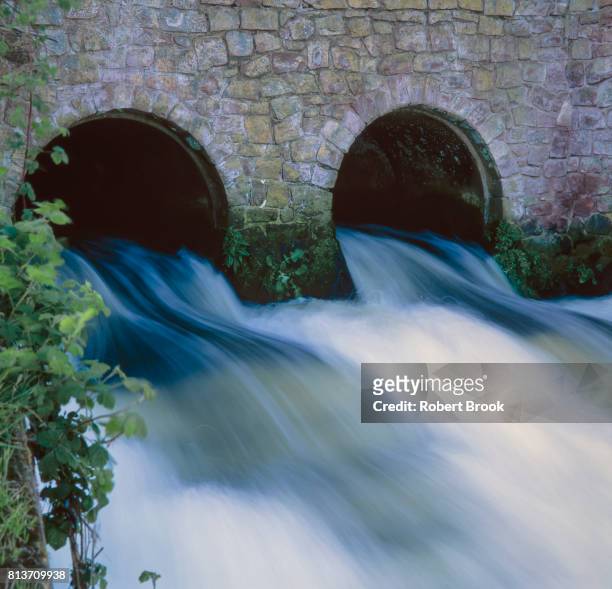 sewage outfall - sewage stock pictures, royalty-free photos & images