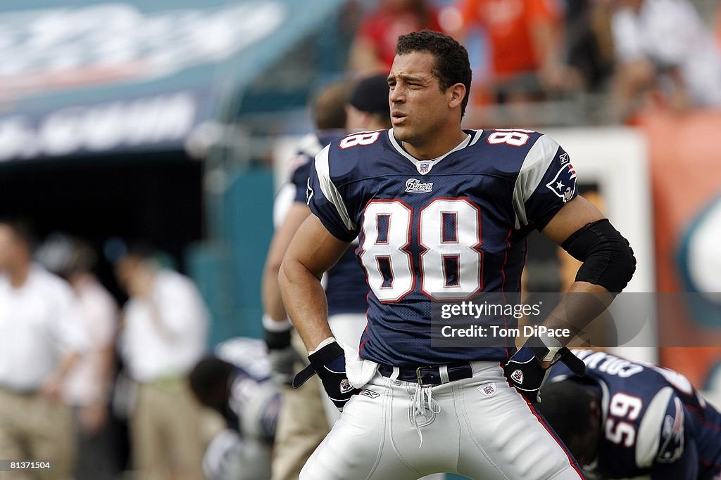 New England Patriots Christian Fauria on sidelines during game vs