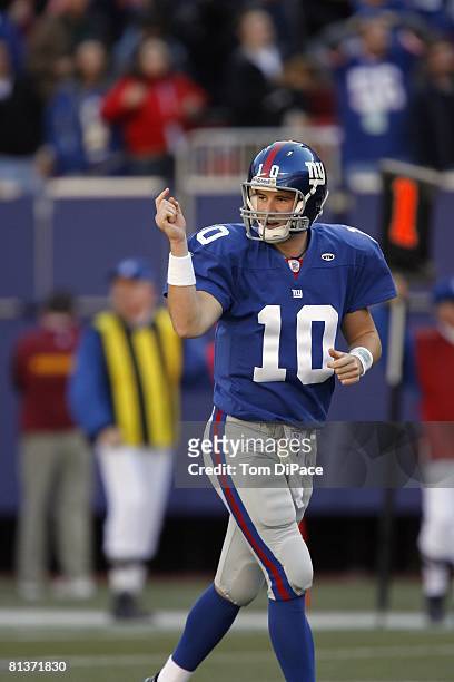 Football: New York Giants QB Eli Manning calling signals during game vs Washington Redskins, East Rutherford, NJ