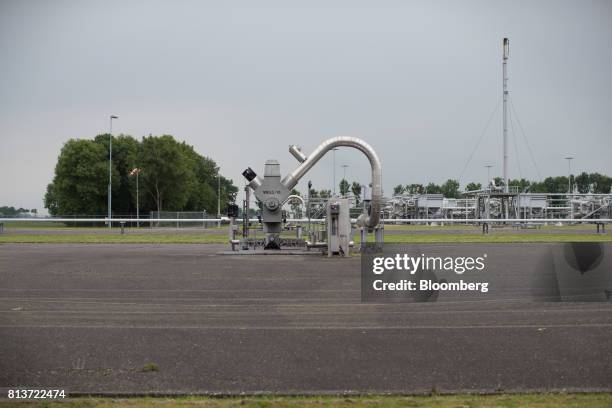 Natural gas extraction machinery and pipework stands above ground at an onshore site, operated by Nederlandse Aardolie Maatschappij BV , in the...