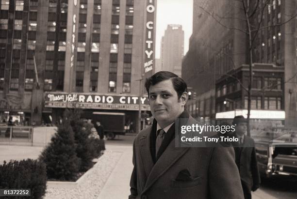 Writer: Portrait of Frank Deford outside Time & Life Building, View of Radio City Music Hall, New York, NY 1/6/1969