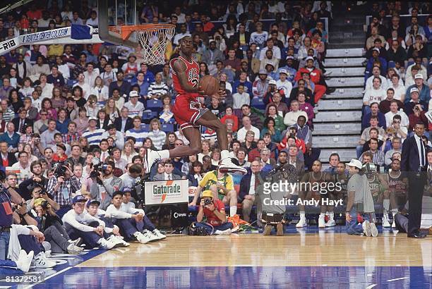 Basketball: NBA Slam Dunk Contest, Chicago Bulls Michael Jordan in action, making dunk during All Star Weekend, Seattle, WA 2/8/1987