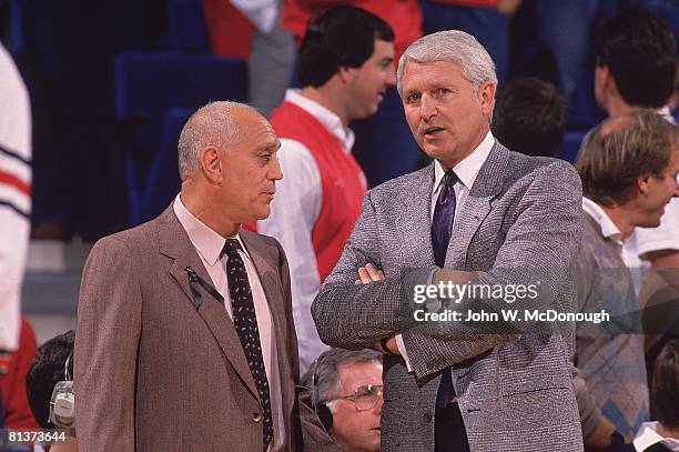 College Basketball: Closeup of Arizona coach Lute Olson talking with UNLV coach Jerry Tarkanian before game, Tucson, AZ