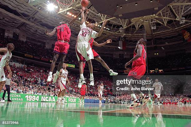 College Basketball: NCAA Final Four, Arkansas Scotty Thurman in action, getting rebound vs Arizona Corey Williams , Charlotte, NC 4/2/1994