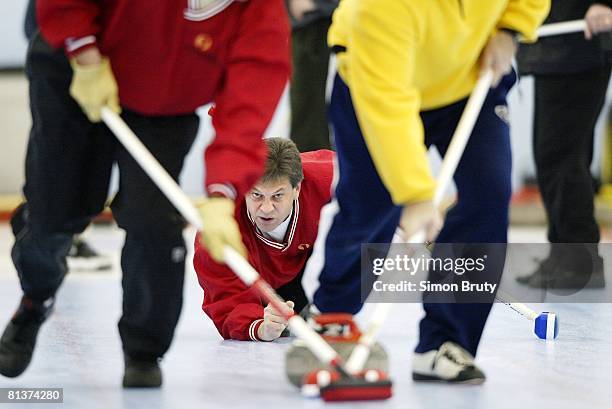 Curling: North Dakota Championship, Bill Pederson in action, Grafton, ND 1/18/2003