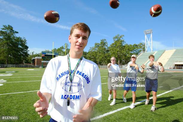 Football: Manning Passing Academy, Portrait of Cooper Manning as father and brothers former New Orleans Saints QB Archie Manning, Indianapolis Colts...