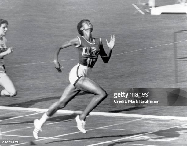 Track & Field: 1960 Summer Olympics, USA Wilma Rudolph in action, winning race, Rome, ITA 8/25/1960--9/11/1960