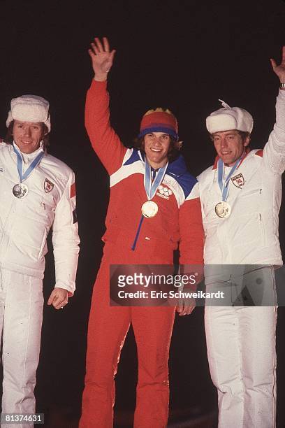 Speed Skating: 1980 Winter Olympics, USA Eric Heiden victorious with gold medal on stand, Lake Placid, NY 2/13/1980--2/24/1980
