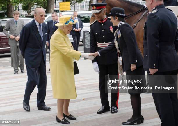 Queen Elizabeth II is greeted by Metropolitan Police Commissioner Cressida Dick as she and the Duke of Edinburgh arrive to open the new Metropolitan...