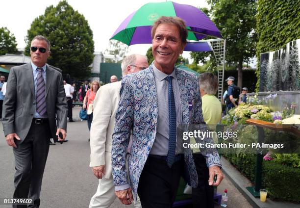 Sir Cliff Richard arrives on day ten of the Wimbledon Championships at The All England Lawn Tennis and Croquet Club, Wimbledon.