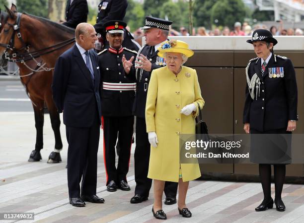 Queen Elizabeth II and Prince Philip, Duke of Edinburgh are welcomed to New Scotland Yard by Metropolitan Police commissioner Cressida Dick and...