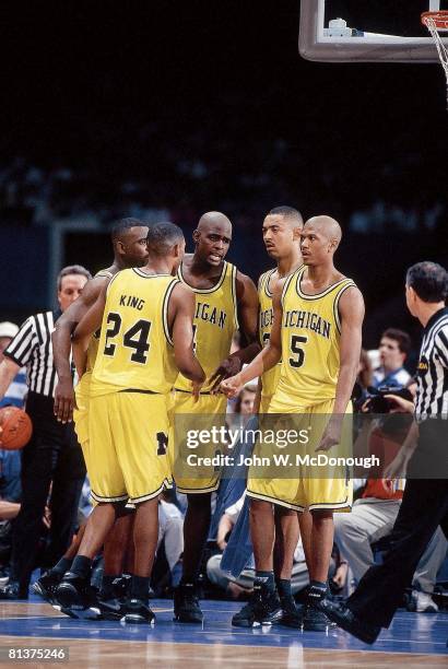 College Basketball: NCAA Final Four, Michigan Fab Five Jimmy King , Ray Jackson , Chris Webber , Juwan Howard , and Jalen Rose on court during game...