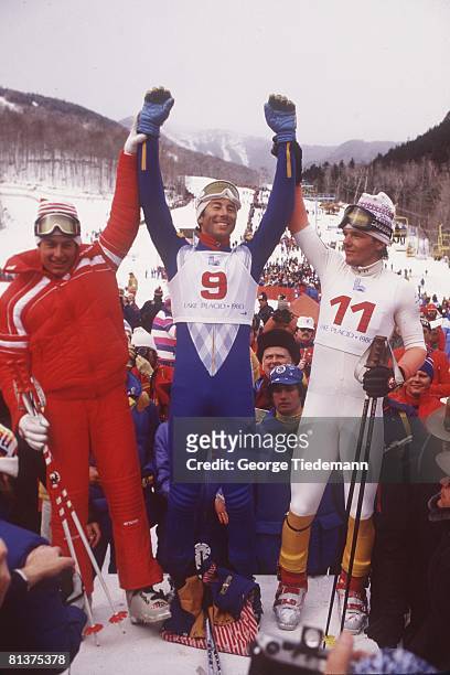 Alping Skiing: 1980 Winter Olympics, Sweden Ingemar Stenmark victorious on medal stand with Liechtenstein Andreas Wenzel and Austria Hans Enn after...