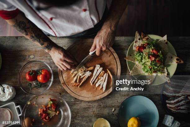 Top View At Tattooed Chef Preparing Caesars Salad High-Res Stock Photo