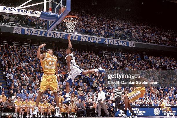 Coll, Basketball: Kentucky's Cliff Hawkins in action vs Tennessee's Jon Higgins , Lexington, KY 2/26/2003