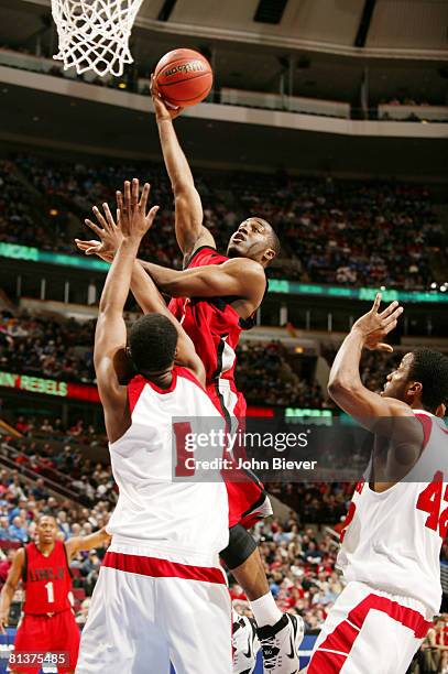 College Basketball: NCAA Playoffs, UNLV Michael Umeh in action, layup vs Wisconsin Marcus Landry and Alando Tucker , Chicago, IL 3/18/2007