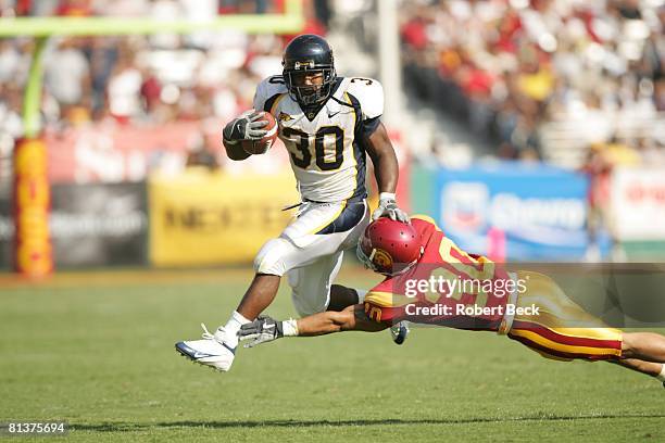 College Football: Cal J,J, Arrington in action vs USC Kevin Arbet , Los Angeles, CA 10/9/2004