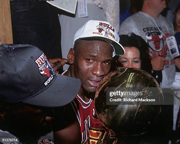 Basketball: finals, Closeup of Chicago Bulls Michael Jordan victorious with wife Juanita and trophy after game vs Los Angeles Lakers, Los Angeles, CA...