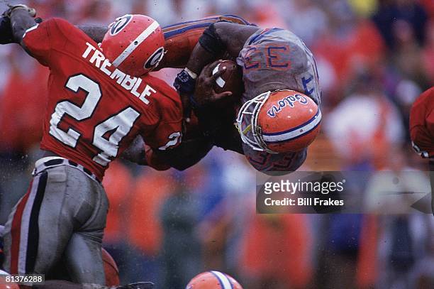 College Football: Georgia Greg Tremble in action, making tackle vs Florida Errict Rhett , Jacksonville, FL