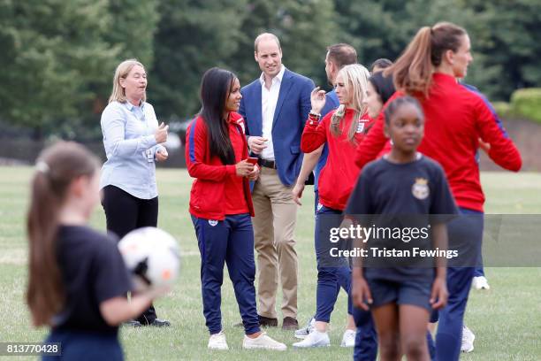 Prince William, Duke of Cambridge attends a kick-about with the Lionesses and local girls team from the Wildcats Girl' Football programme on July 13,...