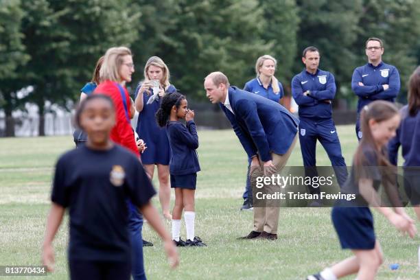 Prince William, Duke of Cambridge attends a kick-about with the Lionesses and local girls team from the Wildcats Girl' Football programme on July 13,...