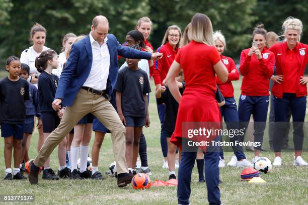 Prince William, Duke of Cambridge attends a kick-about with the Lionesses and local girls team from the Wildcats Girl' Football programme on July 13,...