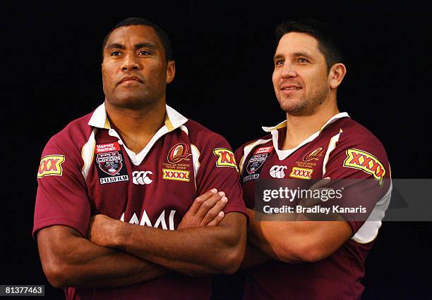 Front-rowers Petero Civoniceva and Steve Price pose after the announcement of the Queensland Maroons State of Origin team to play New South Wales for...