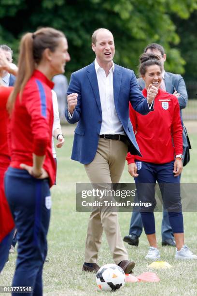 Prince William, Duke of Cambridge attends a kick-about with the Lionesses and local girls team from the Wildcats Girl' Football programme on July 13,...