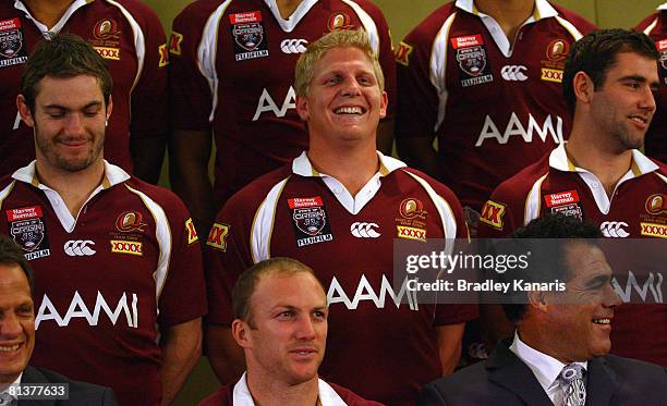 Ben Hannant shares a laugh with team mates as they pose for the official team photo after the announcement of the Queensland State of Origin team to...