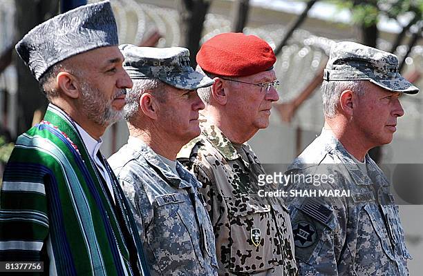 Afghan President Hamid Karzai , outgoing head of NATO's International Security Assistance Force US General Dan McNeill , Commander of the Joint...