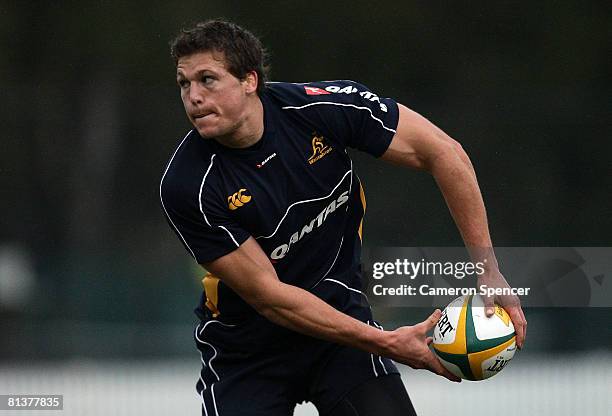 Luke Burgess of the Wallabies passes the ball during an Australian Wallabies training session at Manly Oval on June 3, 2008 in Sydney, Australia.