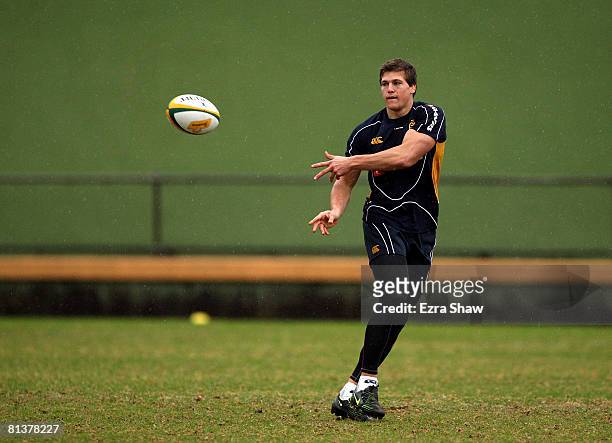Luke Burgess of the Wallabies passes the ball during an Australian Wallabies training session at Manly Oval on June 3, 2008 in Sydney, Australia.