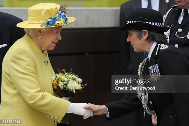 Queen Elizabeth II leaves New Scotland Yard with Metropolitan Police commissioner Cressida Dick on July 13, 2017 in London, England. The visit marked...