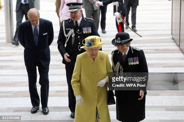 Queen Elizabeth II and Prince Philip, Duke of Edinburgh are accompanied by Commissioner of the Metropolitan Police Cressida Dick and Deputy...