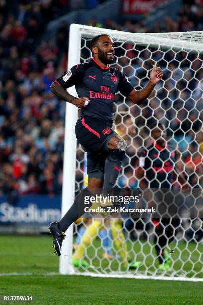 Alexandre Lacazette of Arsenal celebrates scoring a goal during the match between Sydney FC and Arsenal FC at ANZ Stadium on July 13, 2017 in Sydney,...