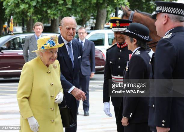 Queen Elizabeth II and Prince Philip, Duke of Edinburgh are greeted by Commissioner of the Metropolitan Police Cressida Dick and Deputy Commissioner...